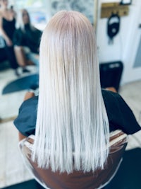 the back of a woman's hair in a salon